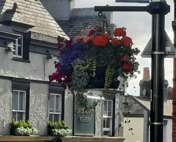 Neston town centre hanging baskets